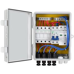 an electrical box with multiple wires and switches in it on a white background, showing the inside of the enclosure