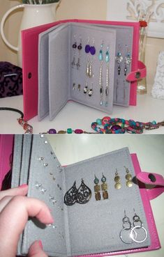 the inside of a pink case with jewelry in it and on top of a white table