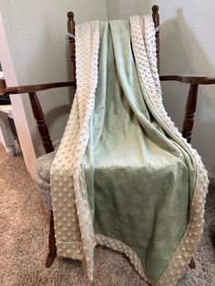 a chair with a blanket on top of it