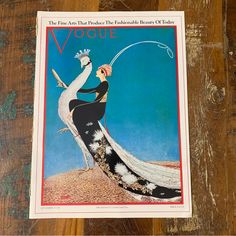 a magazine with an image of a woman in a long dress holding a fishing rod