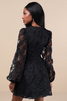 Endless compliments will always be the result of strutting out in the Lulus Gorgeous Outcome Black Mesh 3D Applique Long Sleeve Mini Dress! Three-dimensional floral-like appliques adorn a sheer mesh overlay (with dainty polka dot details throughout) as it shapes a lightly gathered bodice, a V-neckline, and sheer balloon sleeves with elastic at the cuffs. A banded, empire-style waist boasts two, tying velvet ribbon bows at the center, all atop a flirty skater skirt with a mini hem. Hidden back zipper/clasp. Fit: This garment fits true to size. Length: Mid-thigh. Size medium measures 33.25" from shoulder to hem. Bust: Great for any cup size. Waist: Fitted - very fitted at natural waist. Hip: Not Fitted - fuller skirt allows room for hips. Undergarments: May be worn with any standard bra. Fab 3d Applique, Vegas Dresses, Gathered Bodice, Rush Dresses, Latest Fashion Dresses, Women Best, Feather Dress, Gala Dresses, Empire Style