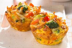 broccoli cheesy egg and veggie cups on a white plate