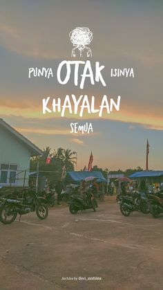 several motorcycles parked in a parking lot with the sun setting behind them and people walking around