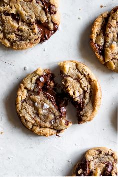 chocolate chip cookies on a white surface