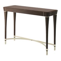 a wooden console table with white legs