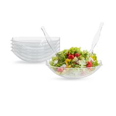 a salad with plastic forks in it on a white background