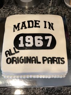 a cake that has been made to look like an original parts company logo on it