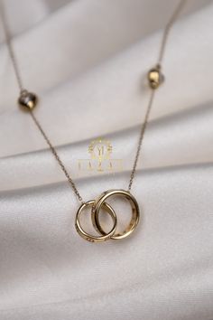 "ABOUT PRODUCT This 14K Gold Wedding Ring Necklace is beautifully designed and hand crafted with our associates to make this a special gift for your loved ones. Knowing the value of our customers, We prepare each piece with extra care and attention. ITEM DETAILS Material: 14K Gold Approx: 3.75 gram  Available colors: Gold, Rose Gold, White Gold Available Sizes: 14\" to 20\" ✪ 14k Solid Gold ( Certification will be included with your order ) ✪Available 14K White, Yellow, Rose Gold (also in 10, 18 Wedding Ring Necklace, 14k Gold Wedding Ring, Woman Necklace, Wedding Ring Necklaces, Zierlicher Ring, Stacked Necklaces, Solid Gold Necklace, Dainty Pendant, Gold Wedding Ring