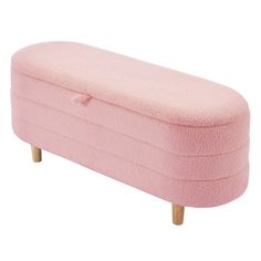 a pink bench sitting on top of a wooden leg rester in front of a white background