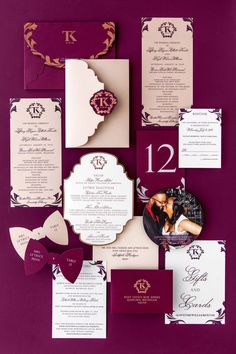 the wedding stationery is laid out on top of each other