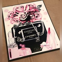 a chanel advertisement with pink roses and pearls