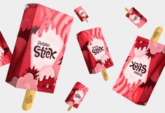 an ice cream popsicle with pink and red designs on it, surrounded by other popsicles