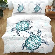 a bed with two sea turtles on it and blue circles in the middle is shown