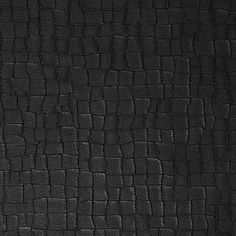 black leather textured with small squares and lines