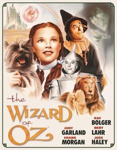 the wizard of oz movie poster with an image of a woman holding a cat and dog