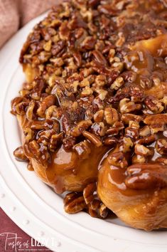 a plate topped with pecans and caramel