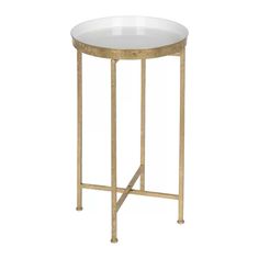 a white and gold side table with a glass top on an iron stand, isolated against a white background