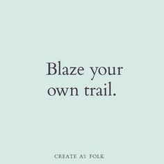 the words blaze your own trail are shown in black on a light blue background with white lettering