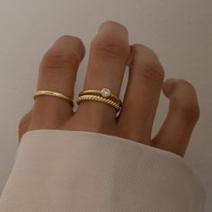 The best stacking set you'll find! This is a versatile combination of 3 rings, that are great together or mixed with other rings. There's texture, simplicity and some bling - the perfect combination for stacking rings! - - - D E T A I L S - - -  * Made of 925 Sterling Silver * THICK plating of 14k Gold or Rhodium * Nickel-free & Hypoallergenic  * Sold as a Set of 3  Not sure of your ring size? We recommend getting our ring sizer!  https://www.etsy.com/listing/1240904225/ring-sizer-reusable-ring-sizer-plastic?click_key=9fae8f5333500ea7ab6397fe5c99715c01abd88f%3A1240904225&click_sum=fa895eb7&ga_search_query=ring%2Bsizer&ref=shop_items_search_1&pro=1&sts=1 Made with 100% Pure Love ♡ Happy to answer any questions you may have! Comes in a gift-box ready for gift-giving! Let's Connect! 🥰 IG: sa Affordable Gold Minimalist Stackable Rings, Affordable Silver Dainty Stackable Rings, Minimalist Rings Stacking Rose Gold, Cheap Dainty Stackable Rings, Luxury Minimalist Stackable Rings With Round Band, Luxury Minimalist Stackable Rings For Everyday, Affordable Sentimental Stackable Rings For Women, Cheap Trendy Open Stackable Rings, Cheap Trendy Stackable Open Rings