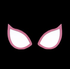 a pair of pink and white eyes on a black background