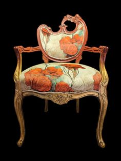 an ornate chair with flowers painted on it's back and arms, sitting against a black background