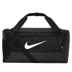 Nike BrasiliaTraining Duffel Bag (Small, 41L)Hit the gym with the duffel bag made to hold all your gear. The ventilated side compartment separates your smelly shoes from your post-sweat-sesh clothes. Get quick access to your phone or keys with the zippered front pocket when you're on the go. Toss it in your locker, next to the power rack and, when you're done, in your car—the coated bottom helps shield your things from bumps, scrapes and spills.Spacious zippered main compartment provides easy access to your gear.Inner zippered pocket stashes your valuables.Adjustable shoulder strap and dual handles give you comfortable carrying options.Ventilated side pocket keeps dirty shoes and sweaty clothes separate from your clean gear.Side pockets hold a water bottle or other small essentials.More De Nike Gym Bag, Nike Duffle Bag, Smelly Shoes, Small Duffle Bag, Sport Nike, Nike Bags, Gianfranco Ferre, Training Gear, Nike Training