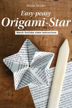 an origami - star is sitting on top of a book with the title easy - peasy origami - star