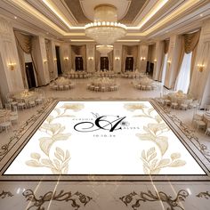 an elegant ballroom with tables, chairs and chandeliers