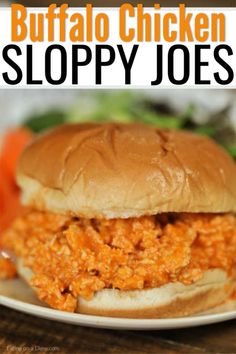 buffalo chicken sloppy joes on a plate with lettuce and carrots