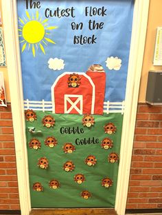 a door decorated with an image of a barn and the words, the cutest flock on the block