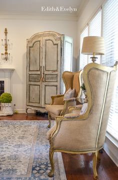 a living room filled with furniture and a fire place