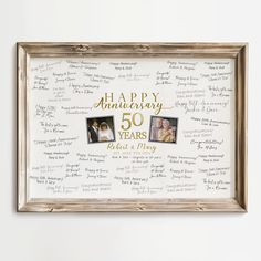 a 50th anniversary photo frame with writing on it