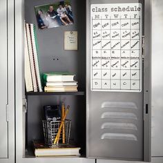 an open locker with several books and pictures on it