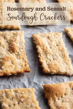 crackers are lined up on a sheet of wax paper and ready to be baked