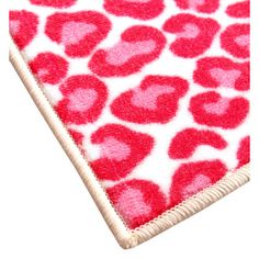 a red and white rug with hearts on it