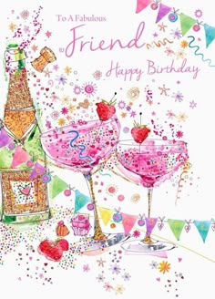 two champagne glasses with strawberries on them next to a bottle and confetti