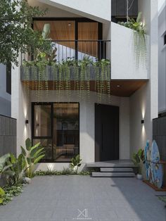 an apartment building with plants growing on the balconies