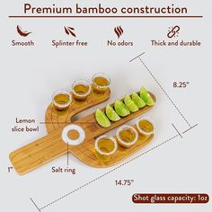 a wooden tray with shots and sauces on it, labeled in the words premium bamboo construction