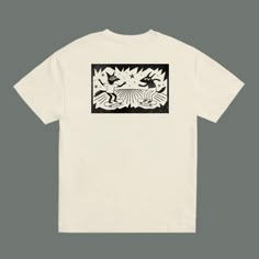 a white t shirt with black and white artwork on it