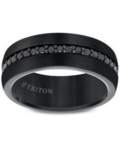 a black wedding band with white diamonds on it and the word triton written in silver