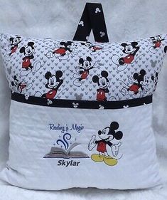 a pillow with mickey mouse on it