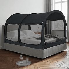 a bed that is in the middle of a room