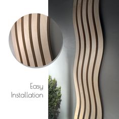 an image of a wooden wall decoration with text overlay that reads easy installation on it