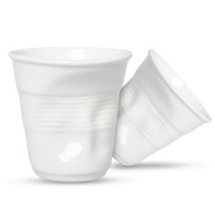 a white coffee cup with the lid open on a white background, it appears to be half empty or half full