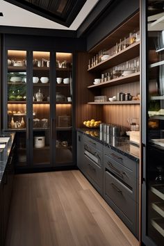 a kitchen with lots of shelves and cabinets filled with pots, pans and other items