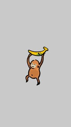 a monkey holding a banana on its back