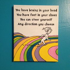 a sign on the wall that says, you have brain in your head you have feet in your shoes you can steer yourself any direction you choose