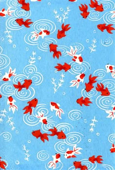 a blue background with red and white fish in the water