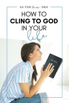 a woman sitting on the floor holding a bible in her hands with text overlay how to cling to god in your life