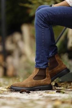 Embrace the winter season in style with these brown suede Chelsea boots. The warm tones and comfortable design make them the perfect footwear for crisp days and cozy evenings.